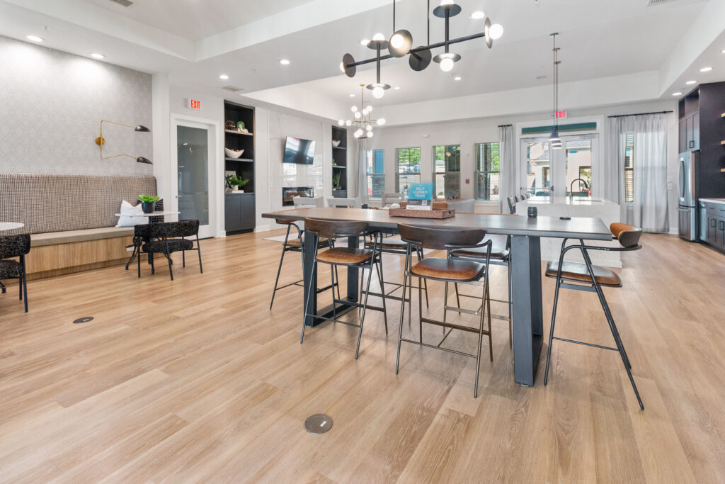 Clubhouse with chairs and table and kitchenette