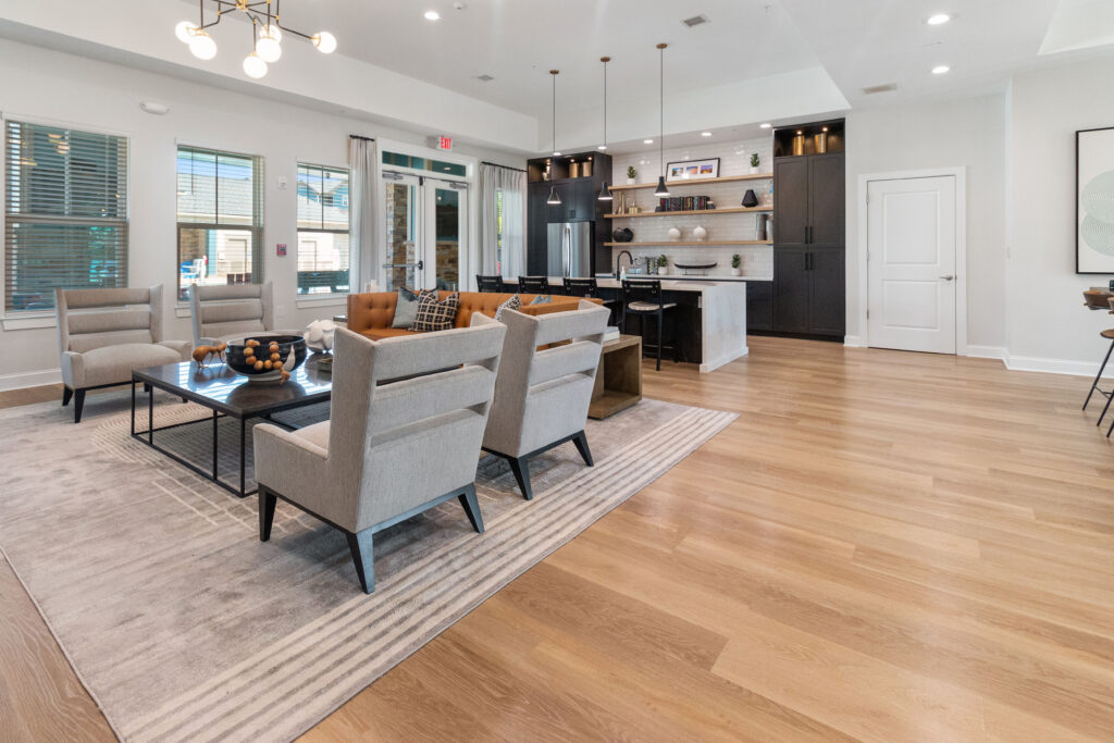 Clubhouse with chairs and table and kitchenette